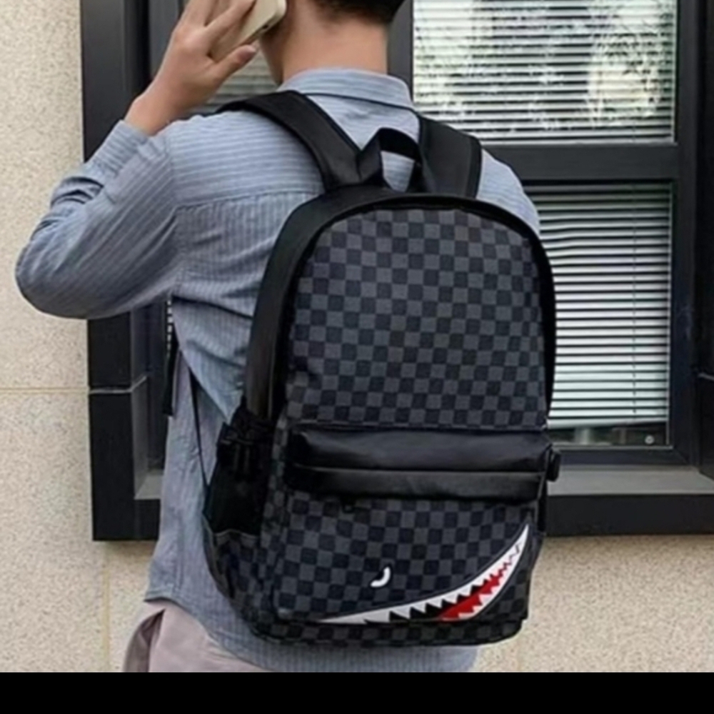 Source Unknown Black and Gray Checkered Backpack
